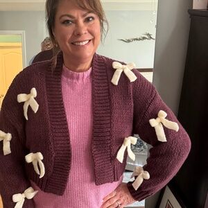 Cute Burgundy Bow sweater by Anthropologie